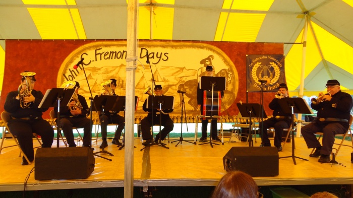 Playing with a reduced complement in the Chautauqua Tent. Still sounded great!
